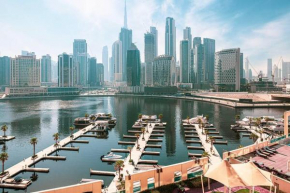 EaseMyTrip - Prime Business Bay Apt with Canal and Marina Views